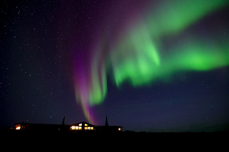 Aurora borealis Dancing over Arctic Haven Wilderness Lodge