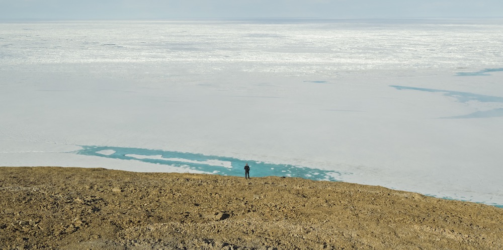 Standing on Canada's northernmost point of land looking out towards the North Pole